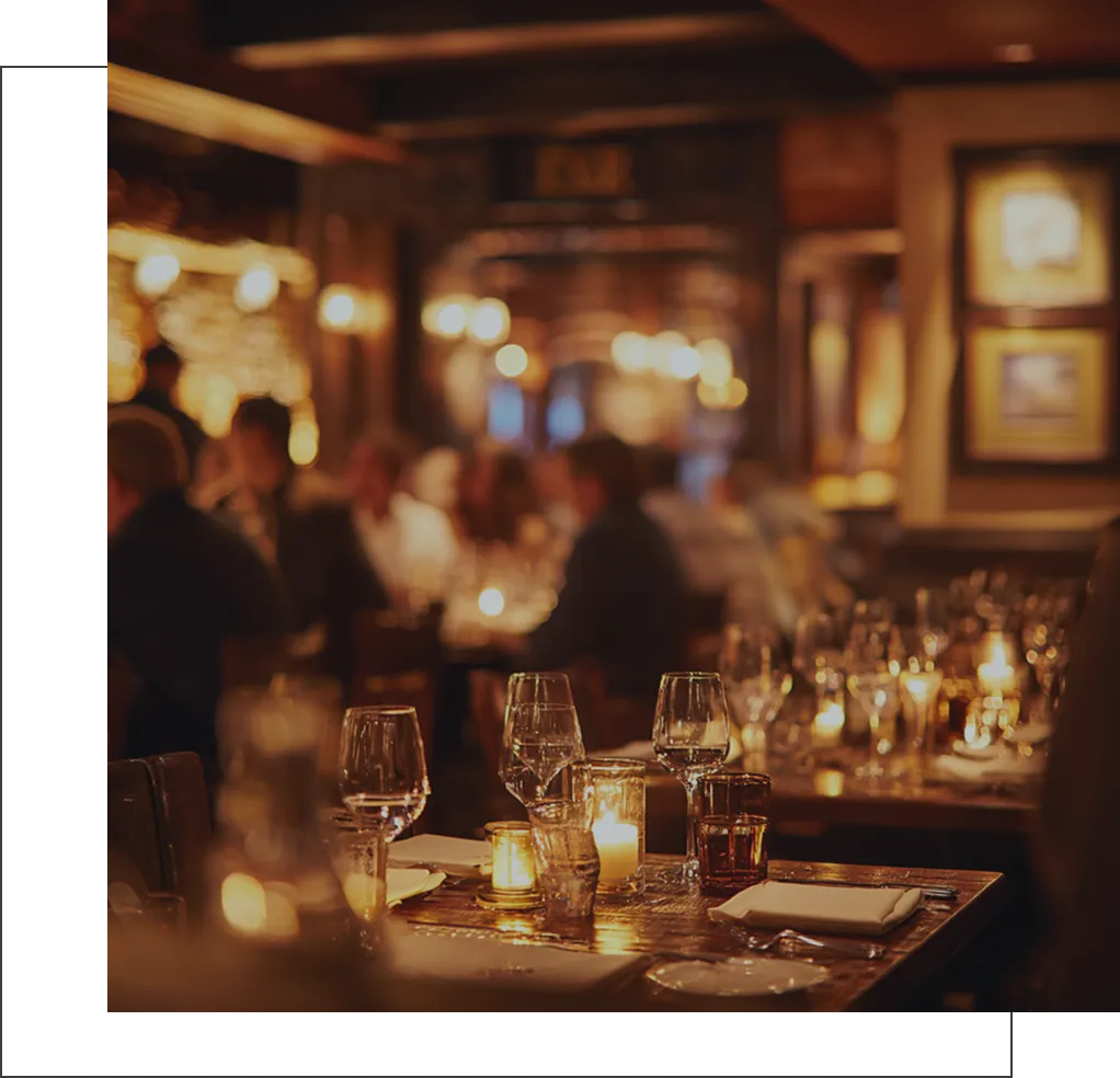 Candlelit restaurant tables with a warm evening atmosphere